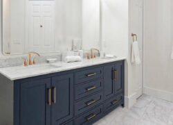 Navy blue vanity with gold hardware